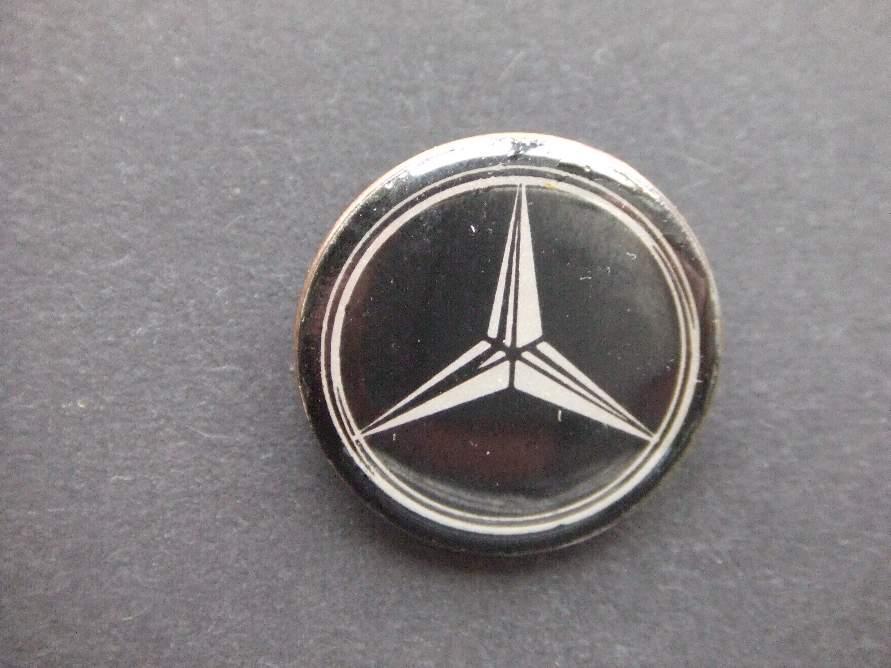 Mercedes logo zwart ster